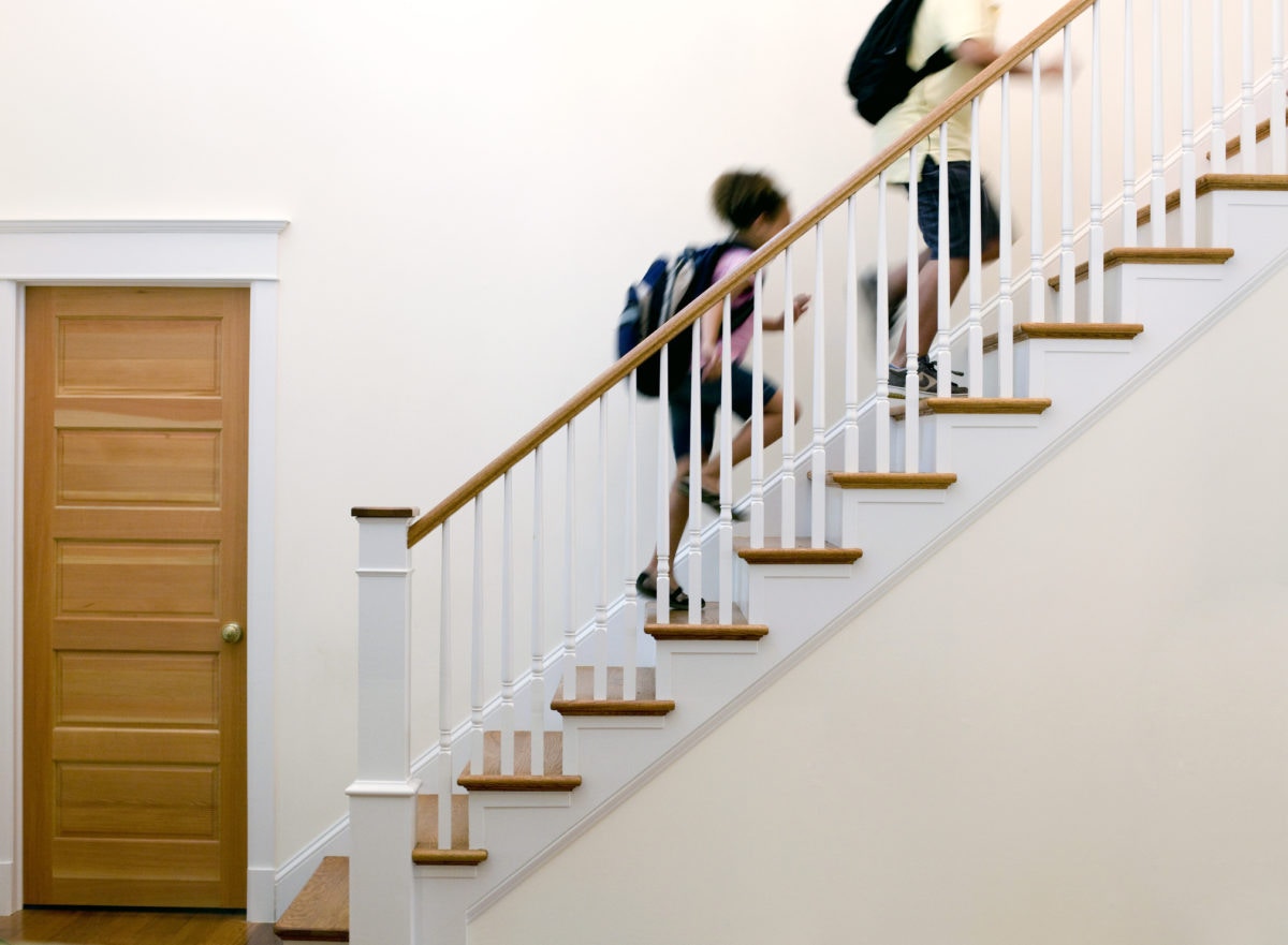 Blurred view of kids climbing stairs
