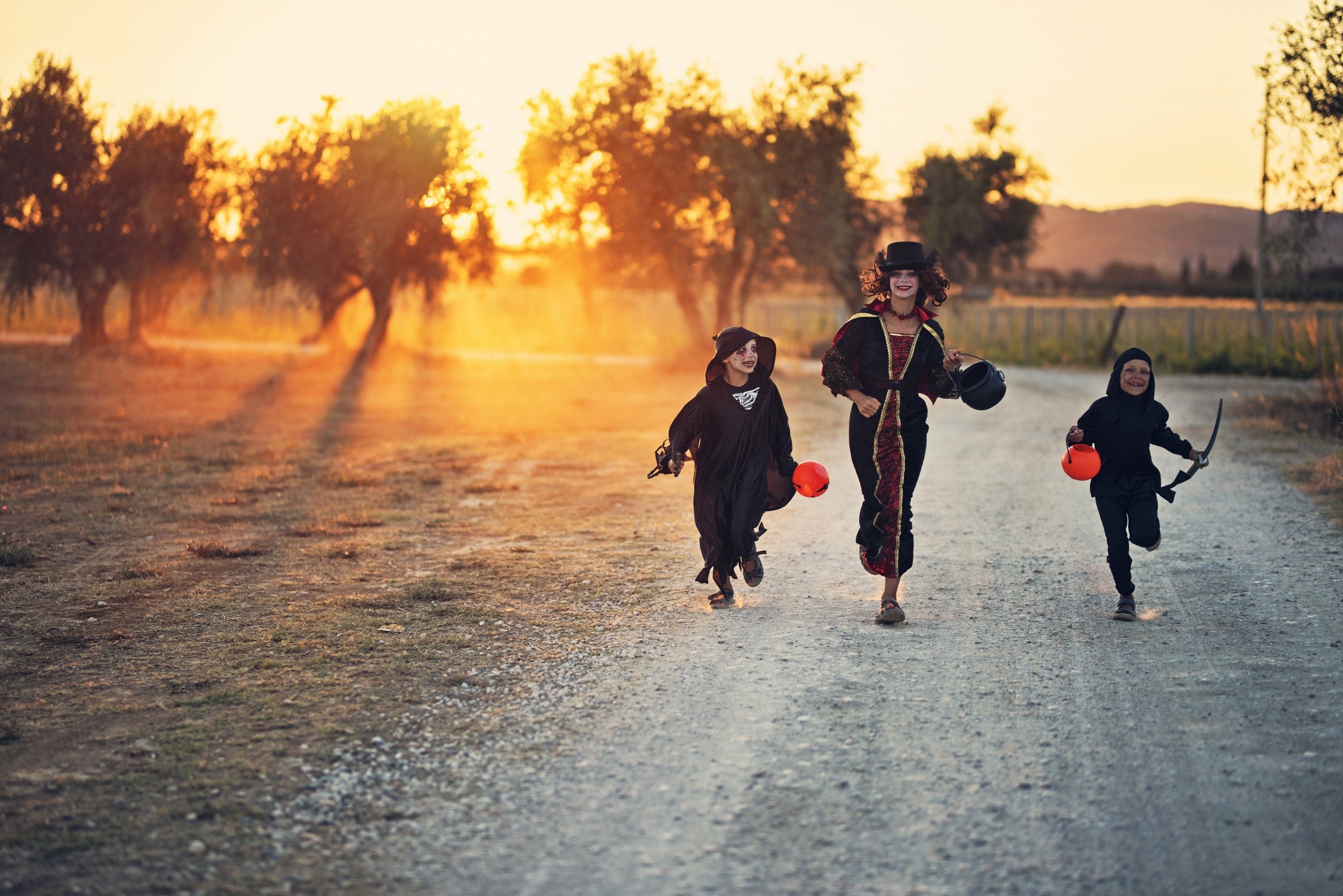 mother and her kids in Halloween Costumes