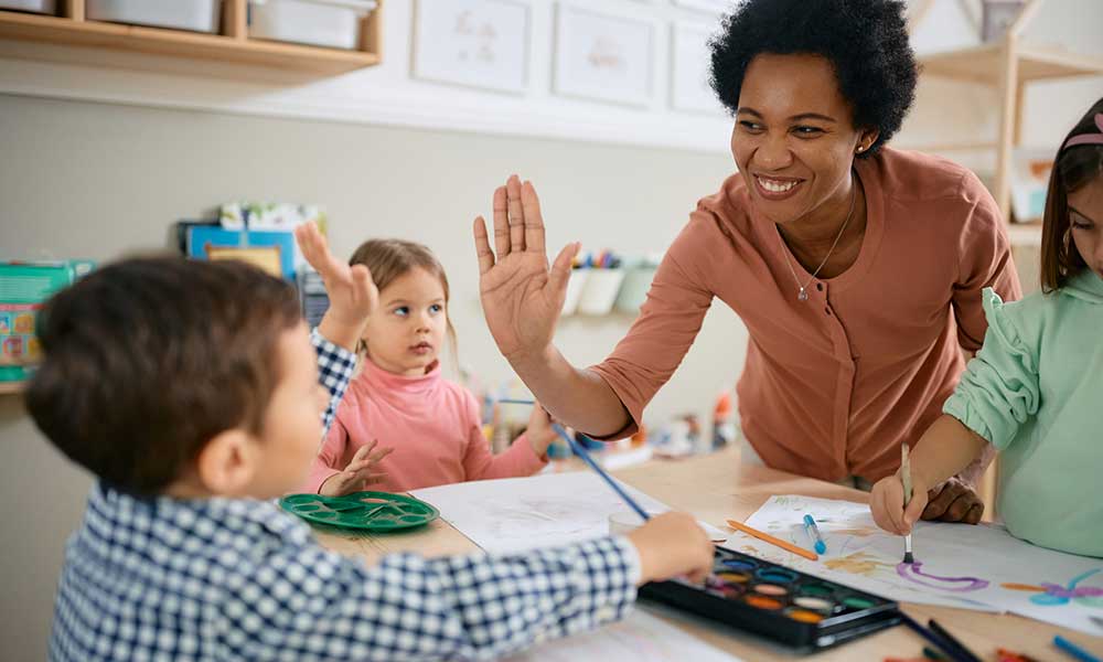 teacher with kids at school