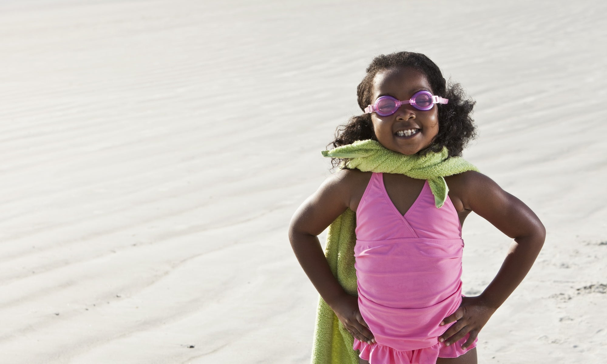 a little girl with goggles