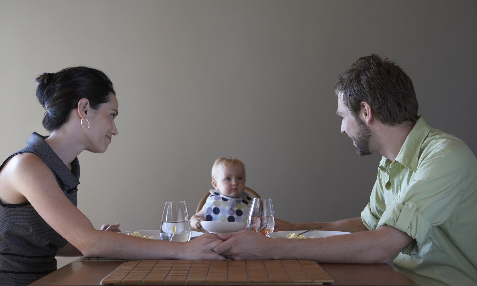 Parents having dinner with child