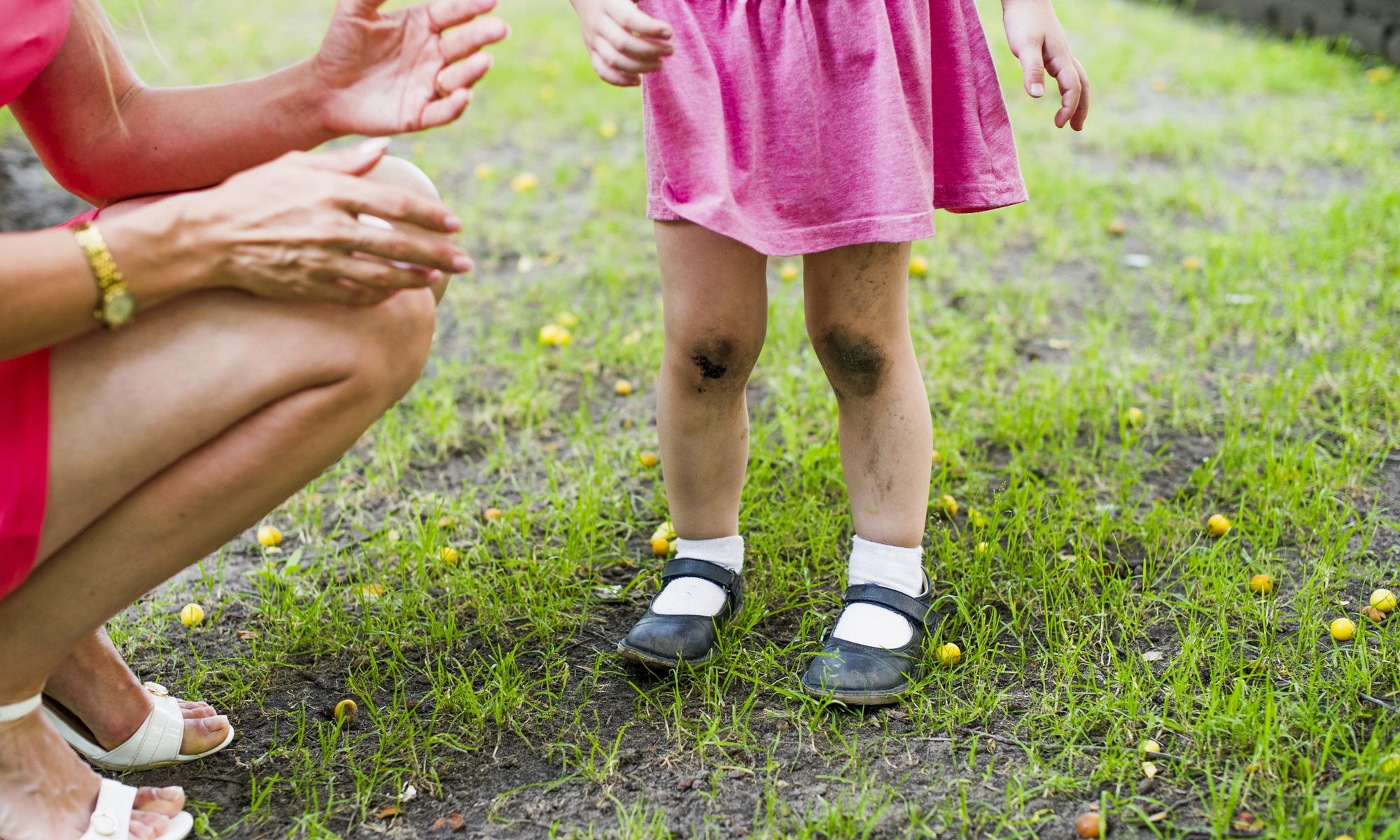 little baby girl legs with dirty knees