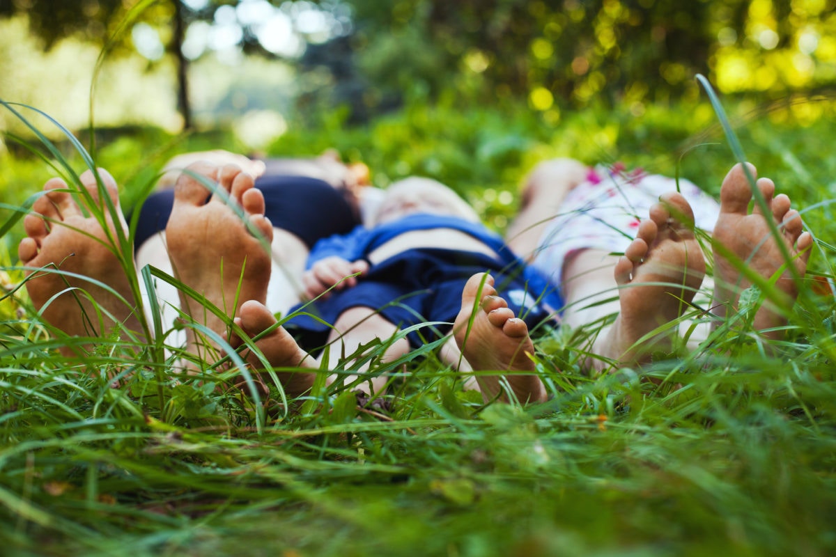 People lying on grass