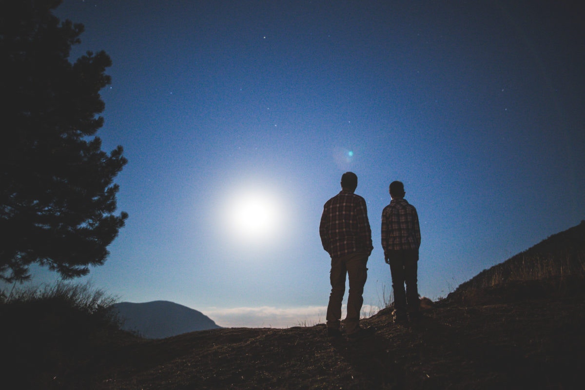 Two person watching sunrise