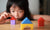 kid playing with blocks