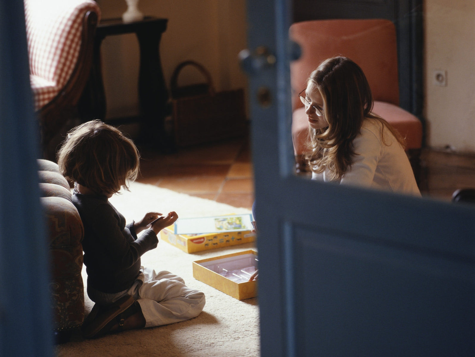 young mother playing with her kid