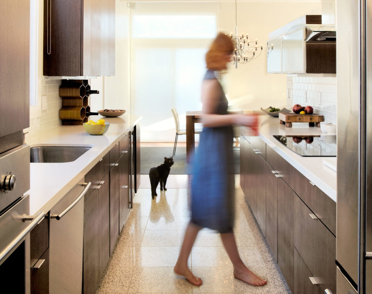 busy woman cooking in kitchen