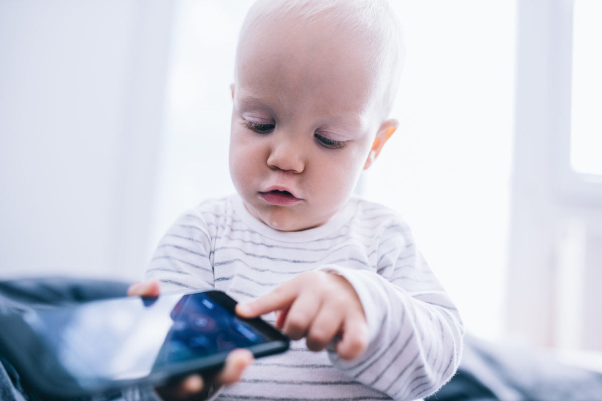 A baby using mobile phone