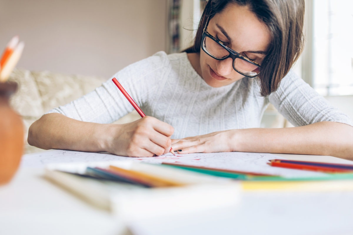 A woman writing something