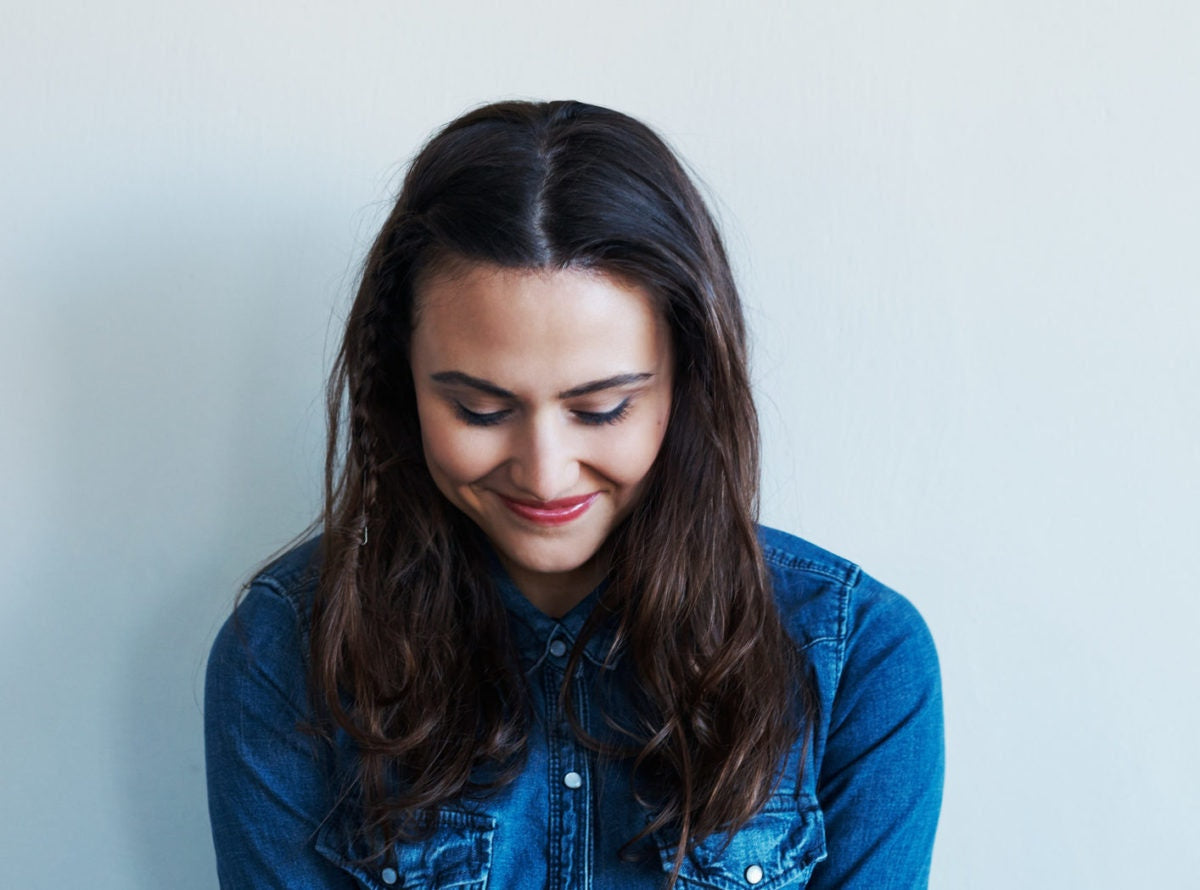 close up of woman looking down  