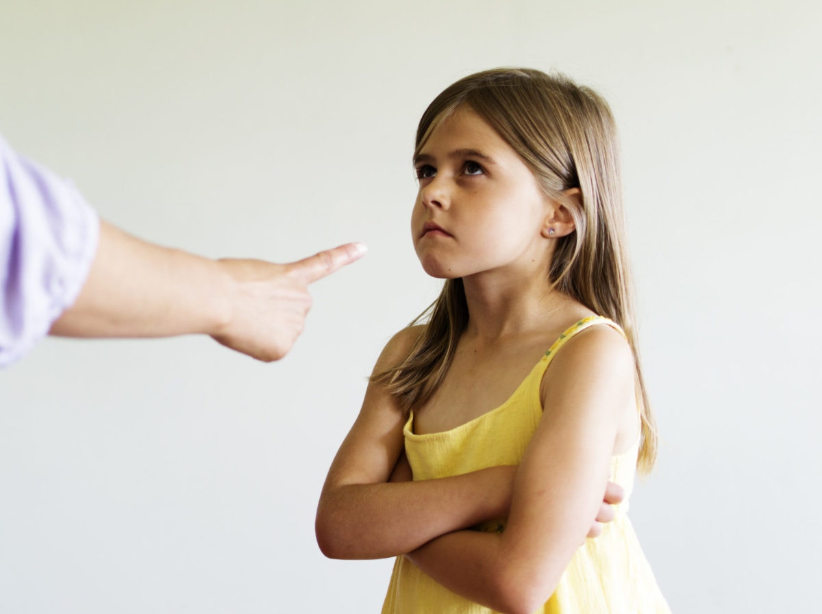 finger point at a girl who is not happy