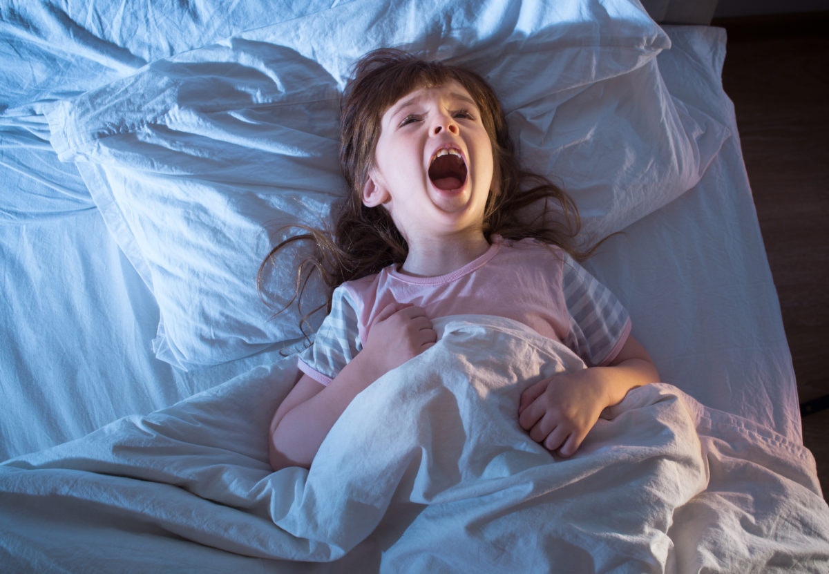 girl yelling in her bed